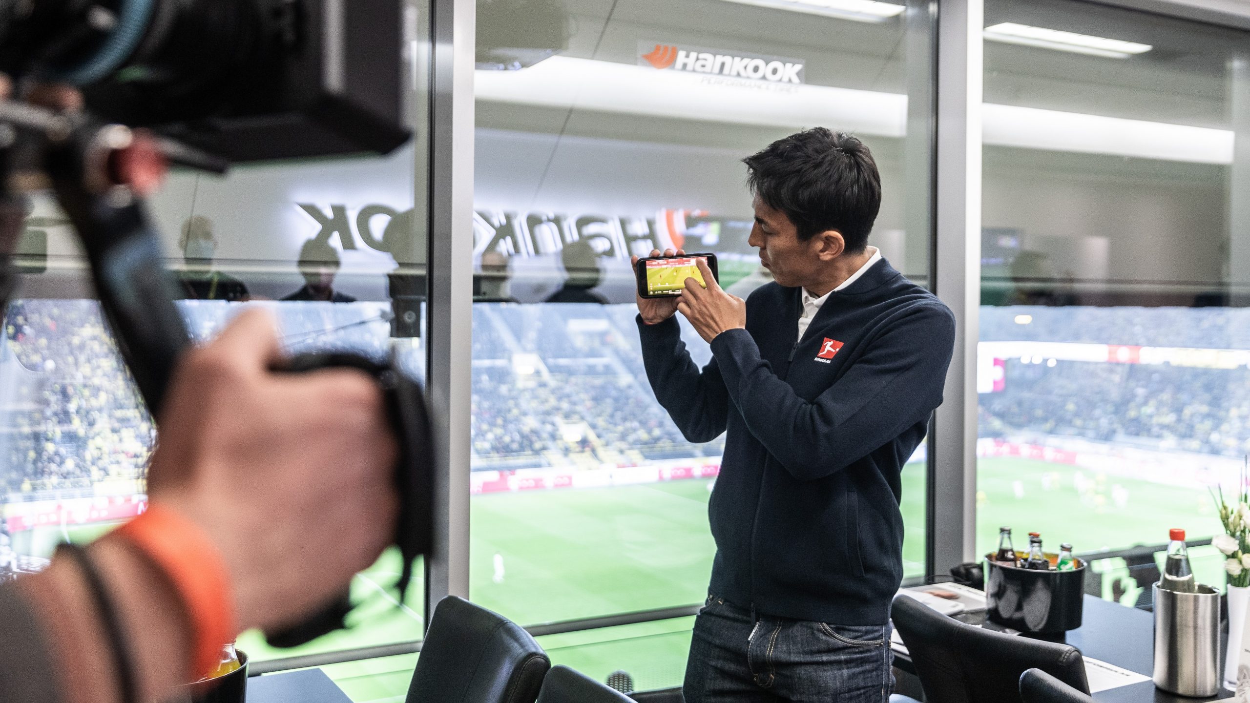 Makoto Hasebe is pictured during the Innovation Games event and the demonstration of the Interactive Feed during the Supercup 2021.